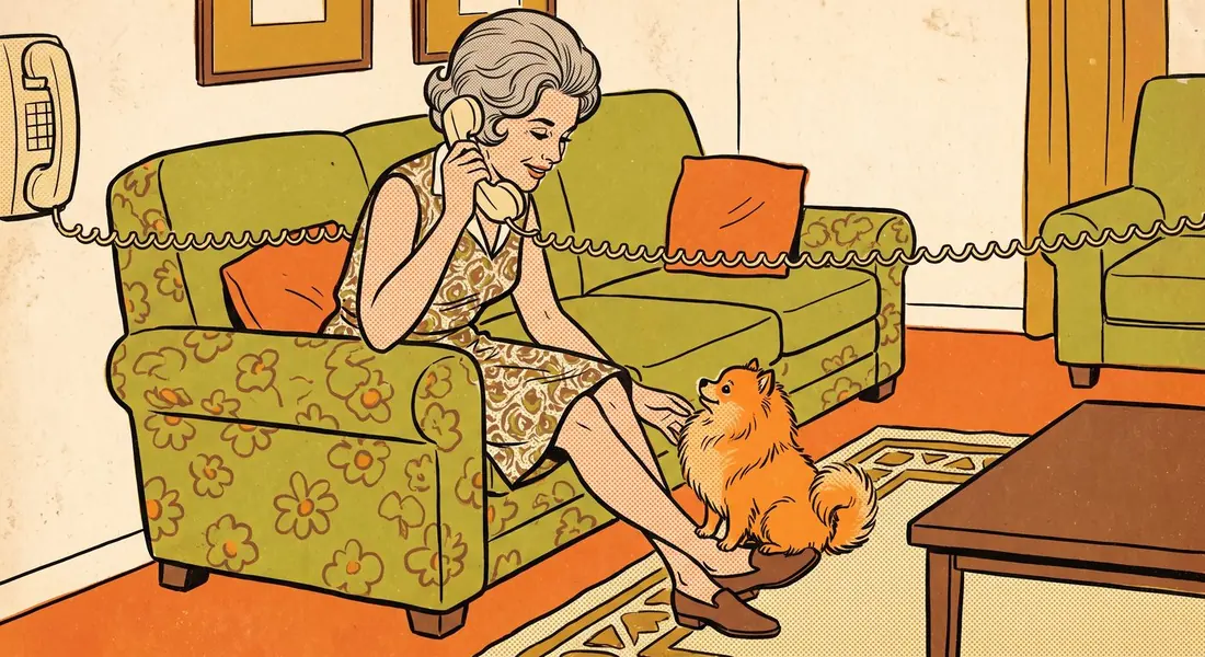 A woman holding a telephone receiver, looking down at her Pomeranian
